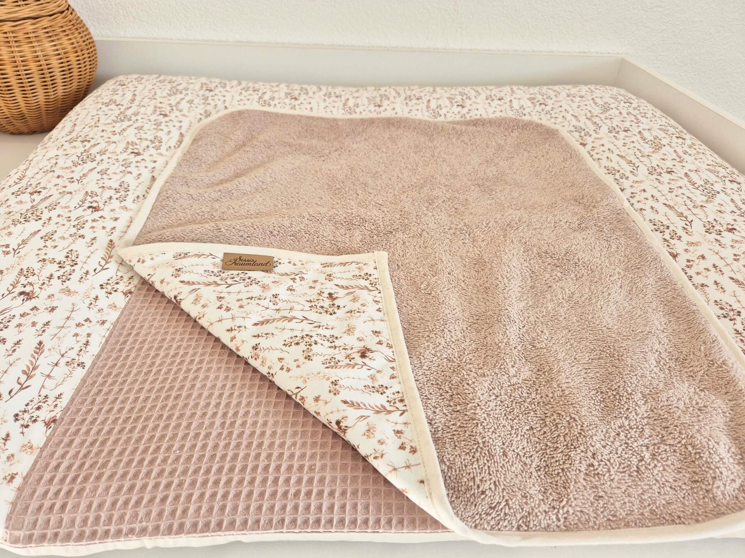 Wickelunterlage Leaves Frottee beige 1 Wickelunterlage Leaves Frottee beige